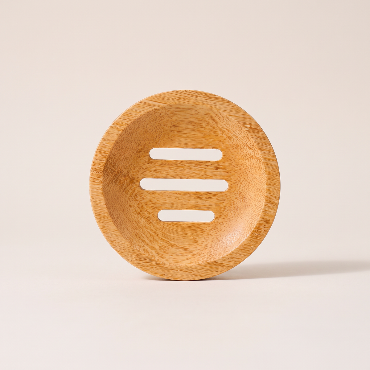 Bamboo shower steamer tray on clean white studio background