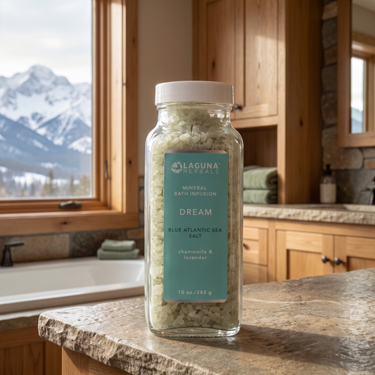 Dream Mineral Bath Salt staged in a mountain cabin bathroom with a mountain view