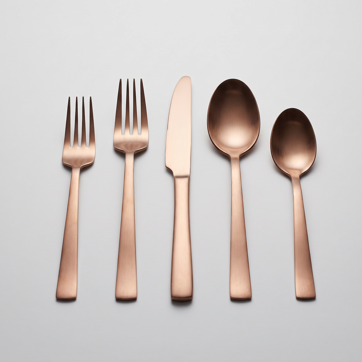 20-Piece Stainless Steel Flatware Set in Bronze, clean studio catalog photo on white background
