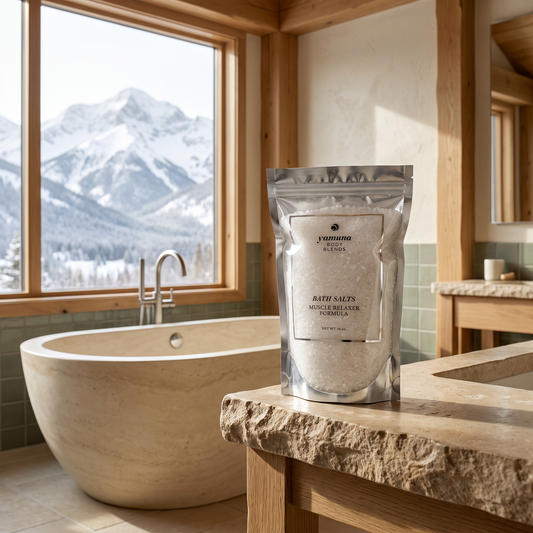 Muscle Relaxer Bath Salt pouch in a mountain cabin bathroom with tub and mountain view