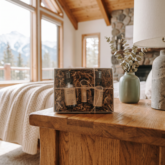 Smudge Spray, Pillow Spray & Relax Roller Gift Set lifestyle photo in a mountain cabin bedroom
